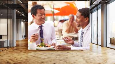 two businessmen having meeting in outdoor restaurant Wall mural