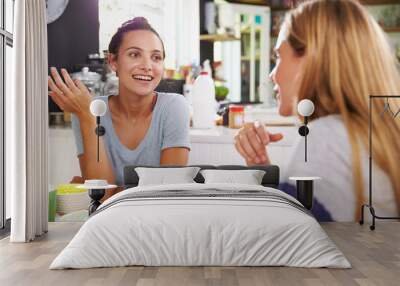 Two Female Friends Enjoying Breakfast At Home Together Wall mural