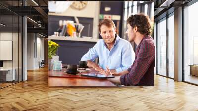 two men meeting at a coffee shop Wall mural