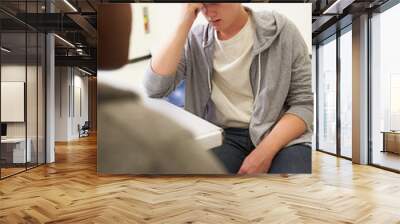 Young Man Talking To Counsellor Who Takes Notes Wall mural