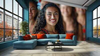 Long-haired girl from a group of Maori dancers smiles Wall mural