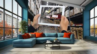 iot smart retail in the futuristic concept, the retailer hold the tablet and use augmented reality technology monitor data of out of shelve, price, planogram, campaign of compliance in the real time Wall mural