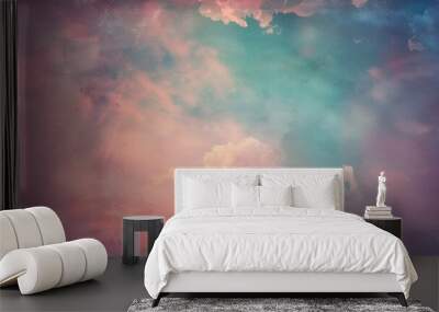 Colorful pastel sky with pink, blue, and purple clouds and a soft grunge texture Wall mural