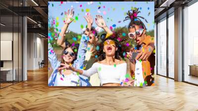 Happy excited friends having fun outdoor celebrating with confetti - Young millenial people enjoying summertime together at garden party - Cheerful friendship concept. Party - festival concept. Wall mural