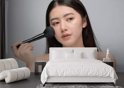 Beautiful young woman asian with clean perfect skin. Portrait model natural make up Wall mural