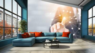 Businessman hand touching global network sphere connection communication and technology concept Wall mural