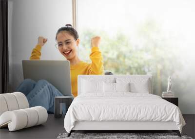 Excited female feeling euphoric celebrating online win success achievement result, young asian woman happy about good email news, motivated by great offer or new opportunity Wall mural