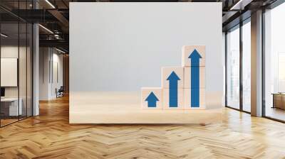 Ladder career path for business growth success process concept.Wooden block stacking as step stair with arrow up Wall mural