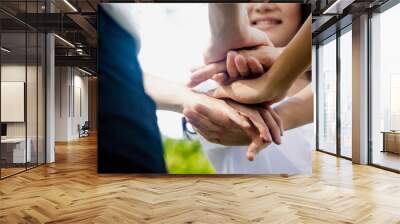 Power of male and female volunteer charity work. Stack of people hand. Team teamwork business join hand together concept Wall mural