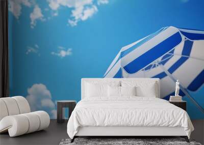 Umbrella beach blue and white with blue sky for sun protection Wall mural