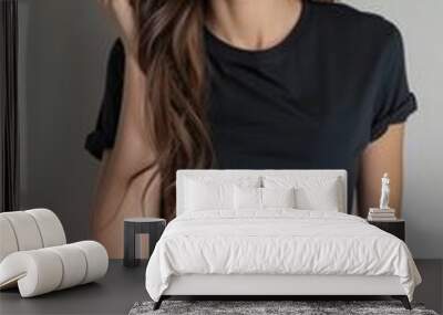 Young female wearing black blank t shirt mockup for print image fashion trendy Wall mural