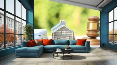 Property auction, Gavel wooden and model house on natural green background, lawyer of home real estate and ownership property concept Wall mural