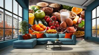 Assorted organic food products on the table Wall mural