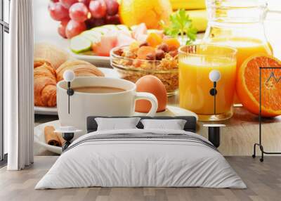 breakfast with coffee, orange juice, croissant, egg, vegetables Wall mural