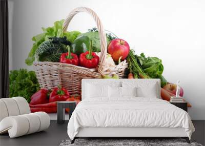 Fresh organic fruits and vegetables in wicker basket Wall mural