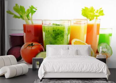 Glasses with fresh organic vegetable and fruit juices on white Wall mural