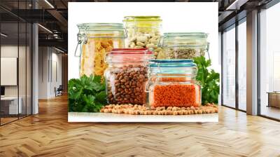 Jars with grain foods isolated on white Wall mural