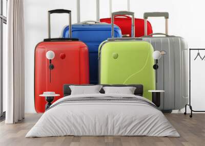 Luggage consisting of polycarbonate suitcases isolated on white Wall mural