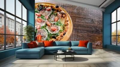 Pizza Italiana served with ham, cheese, tomatoes and rucola Wall mural