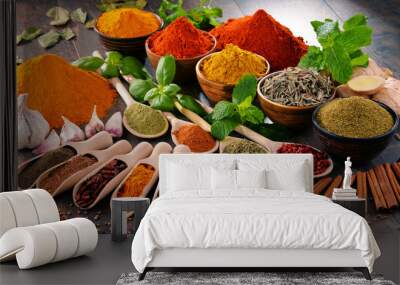 variety of spices and herbs on kitchen table Wall mural