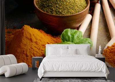 Variety of spices on kitchen table Wall mural