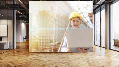 Architect caucasian man working with colleagues mixed race in the construction site. Architecture engineering at workplace. engineer architect wearing safety helmet meeting at contruction site. Wall mural