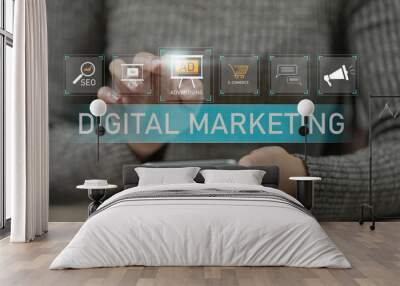 Digital marketing commerce online sale concept, online marketing website ADs, email, social network, video, SEO and business strategy. Person use tablet with digital marketing icon on virtual screen. Wall mural