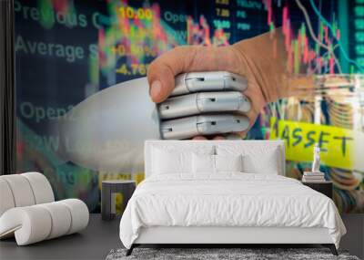 ROBO Advisor concept. Man and robot hand shaking  on abstract investment management background. Wall mural