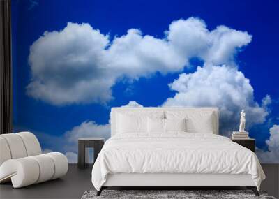 Blue sky with white clouds in daytime. Wall mural