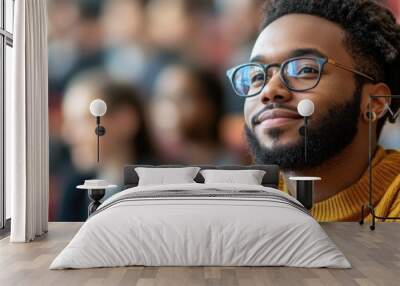 A joyful black university student engaged in a college lecture in an auditorium Wall mural