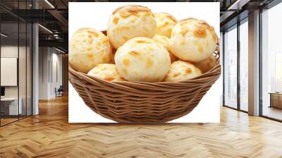 A basket full of baked goods, including a variety of pastries and breads. The basket is made of woven material and is placed on a white background. Concept of warmth and comfort Wall mural