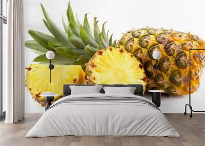 Four yellow pineapples are lined up on a white table Wall mural