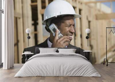 African American engineer on call at construction site Wall mural