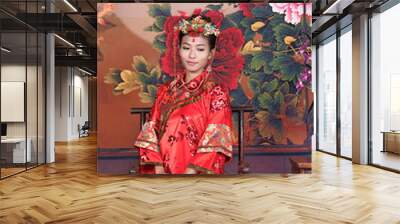 Asia / Chinese girl in red traditional dress Wall mural