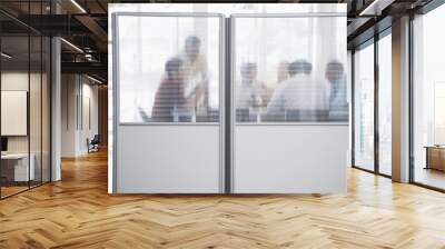 Group of business people in meeting behind translucent wall in office Wall mural