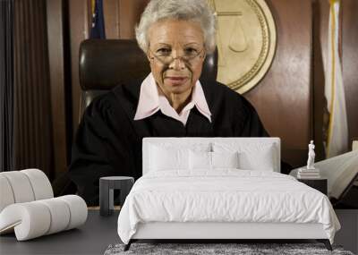 Portrait of a senior female judge with book in courtroom Wall mural