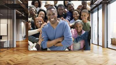 Portrait of cheerful mature man surrounded by people Wall mural