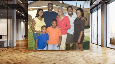 Portrait of happy three generation family standing together in lawn Wall mural