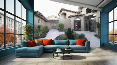 View of cactus garden and courtyard of a home against clear sky Wall mural