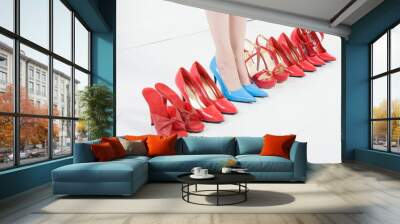 Woman Standing In Blue High Heels Wall mural