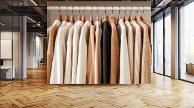 Women's clothing on hangers in wardrobe, closeup. Interior design, Rack with stylish clothes, closeup. Wardrobe interior design Wall mural