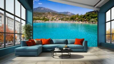 The beautiful, turquoise sea of Kalogira beach, Stoupa, Messenia, Greece, during summer time Wall mural