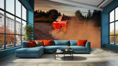 Pickup truck car in motion at country road with clouds of dust Wall mural