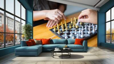 A woman sitting in chess May be interpreted in the planning of the competition in the business. Wall mural