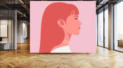 A profile of a red-haired young woman with piercing. Side view. Fashion model. Vector flat illustration Wall mural