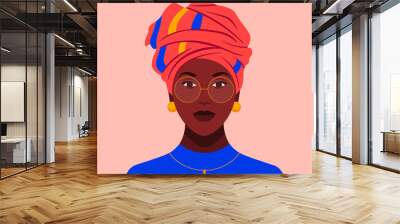 african woman in glasses and a traditional headdress. avatar of a girl with a scarf on her head for  Wall mural