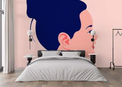 Head of a little European girl in profile. The face of a happy child on the side. Portrait. Avatar. Vector flat illustration Wall mural