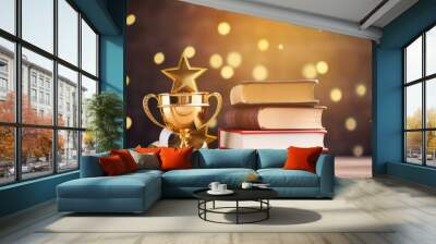 Stack of books with golden cup trophy and medal background. Wall mural