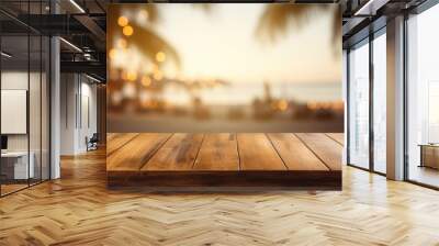 Wooden table and blur beach cafes background. Wall mural