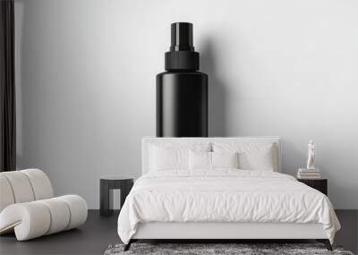 Minimalistic black spray bottle on white background. Capturing modern design for beauty or cleaning products, suitable for various uses. Wall mural